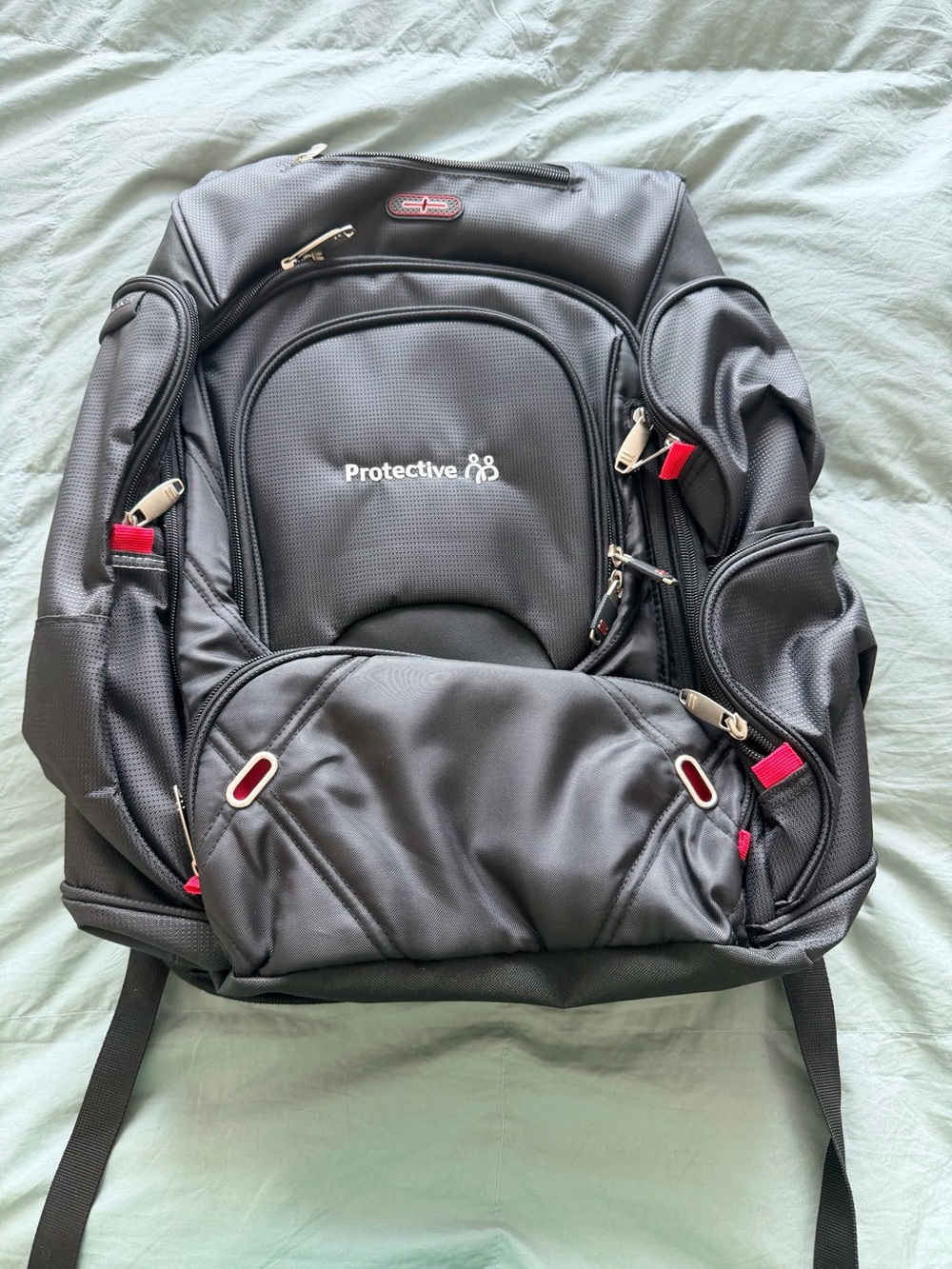 Black Checkmate TSA Men's Backpack with Red Accents